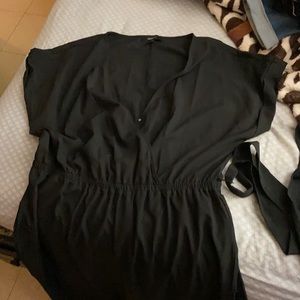 Black jumpsuit with tie . Bootcut leg